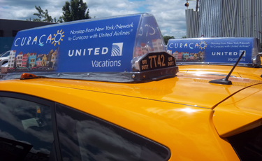 Curacao ad on cab