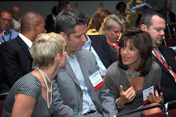 conference-audiencetalking-250png