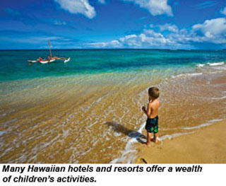 Kid on beach in Hawaii